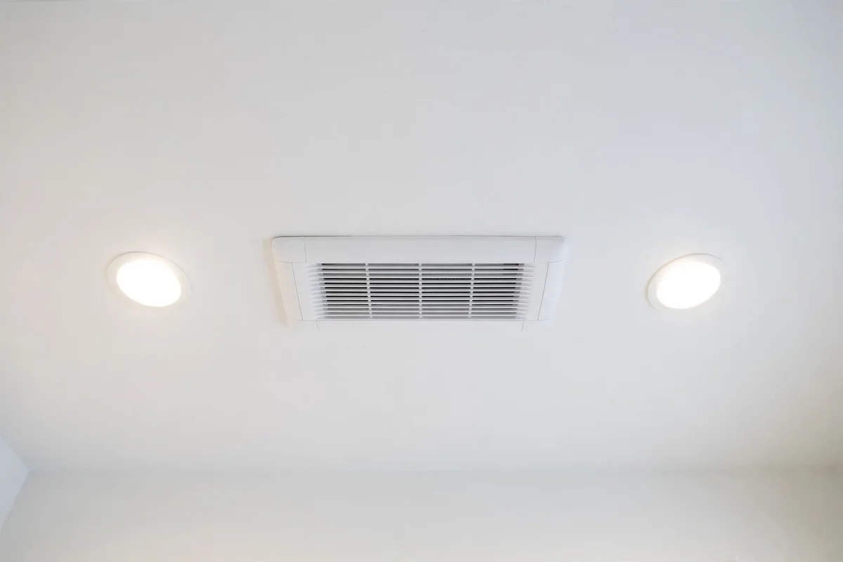 Modern quiet bathroom exhaust fan in white ceiling